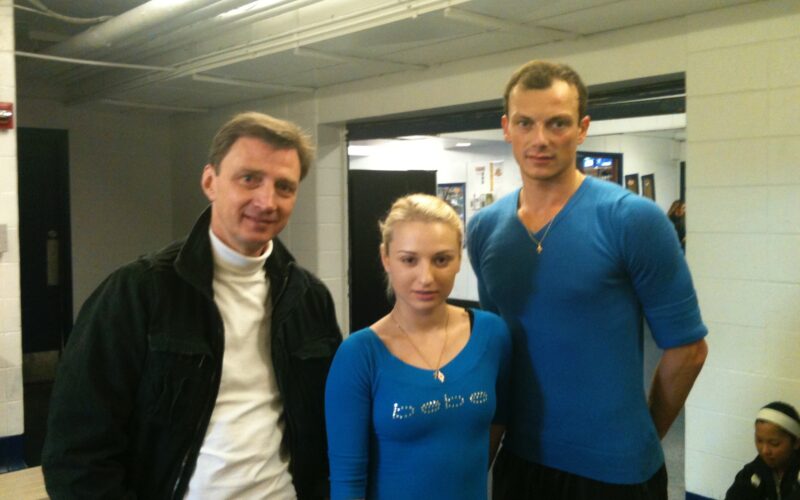 Oleg Vassiliev and a young pair team for the manleywoman skatecast, a figure skating podcast