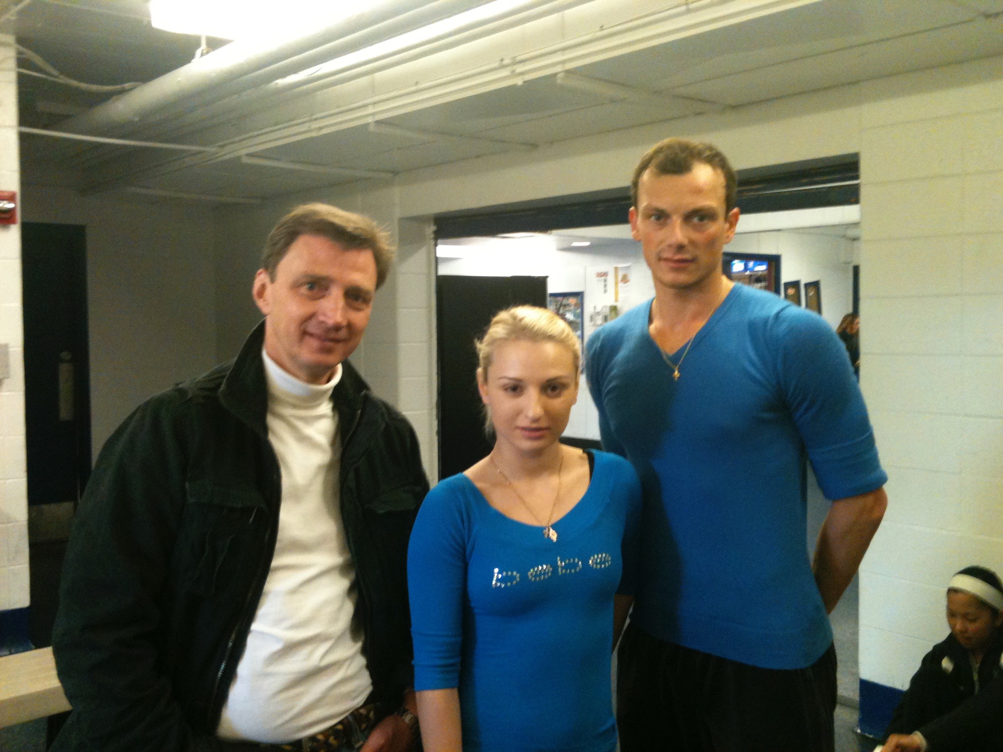 Oleg Vassiliev and a young pair team for the manleywoman skatecast, a figure skating podcast