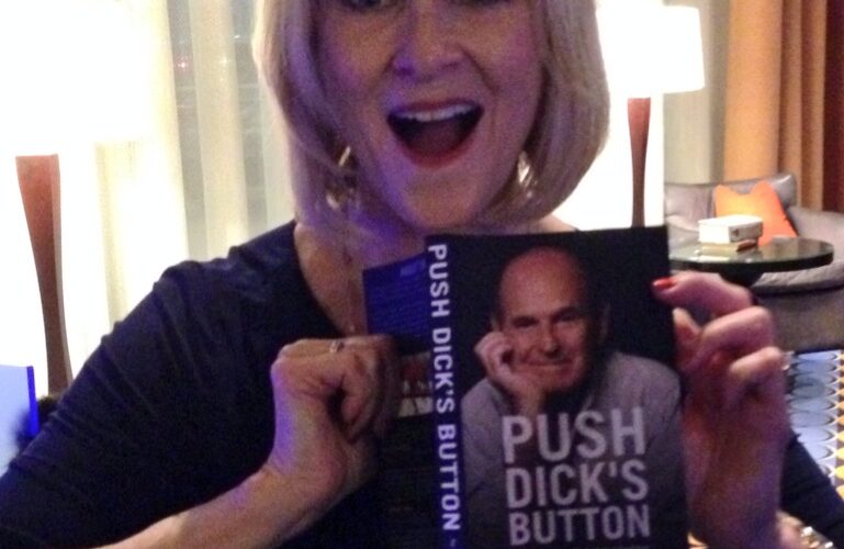 JoJo Starbuck holding up a copy of Dick Button's book in a photo for the manleywoman skatecast, a figure skating podcast