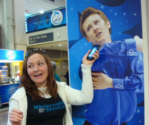 Allison Manley with a photo of Jeremy Abbott in a photo for for the manleywoman skatecast, a figure skating podcast